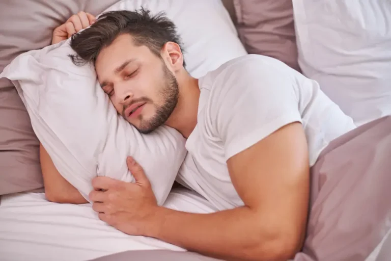 Man peacefully sleeping with a relaxed expression, highlighting testosterone levels during sleep.