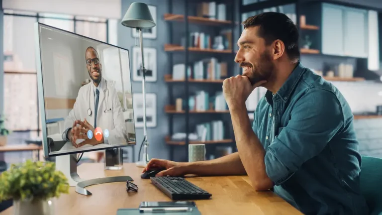 Professional doctor consulting a patient via video call for testosterone replacement therapy at an online TRT clinics